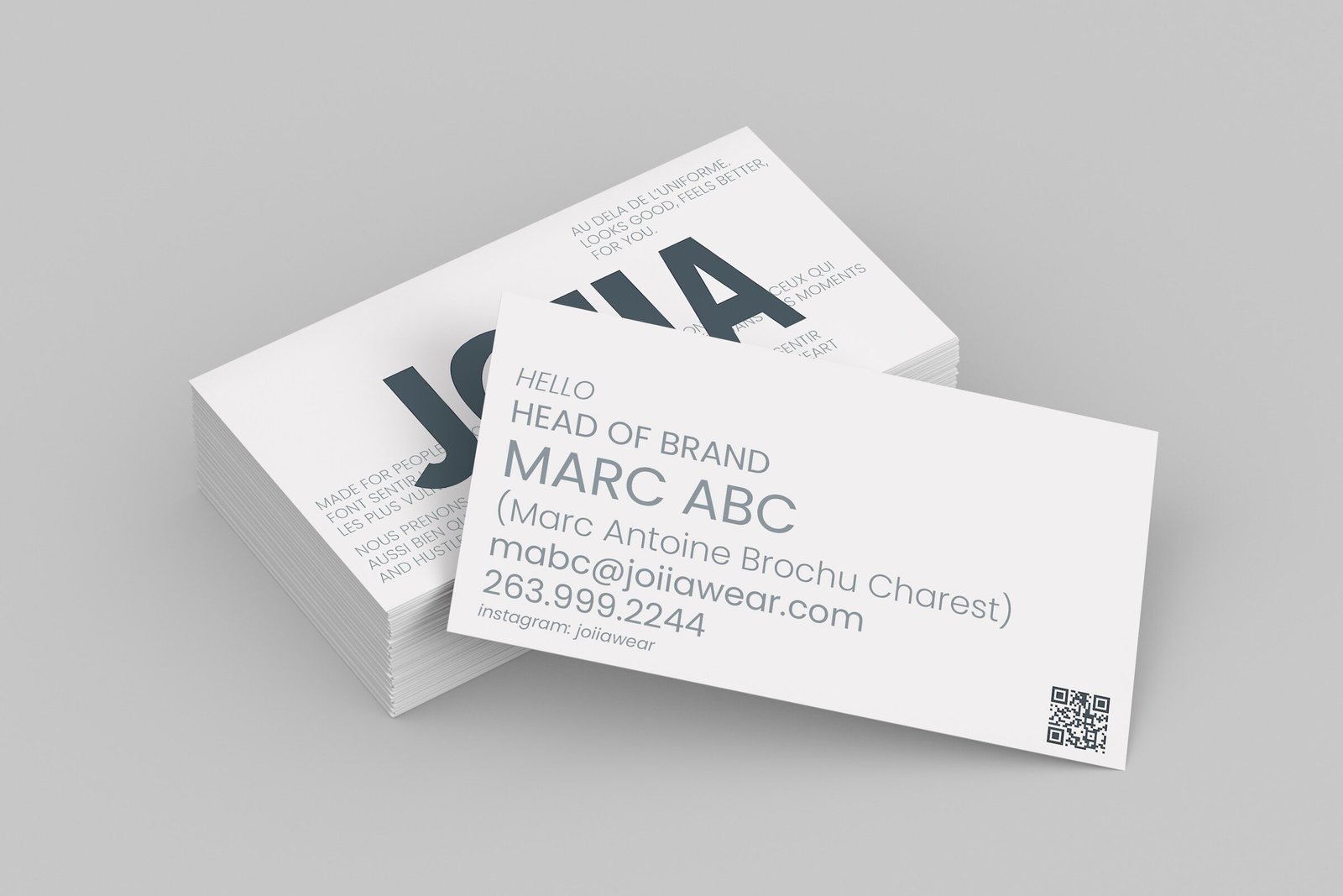 Cartes d'affaires de Joiia Wear en pile