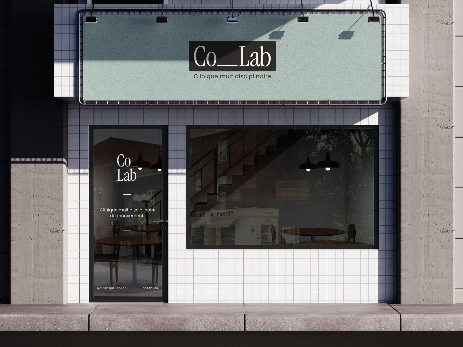 Devanture de la Clinique Co_Lab : bandeau au logo Co__Lab au-dessus de la vitrine
